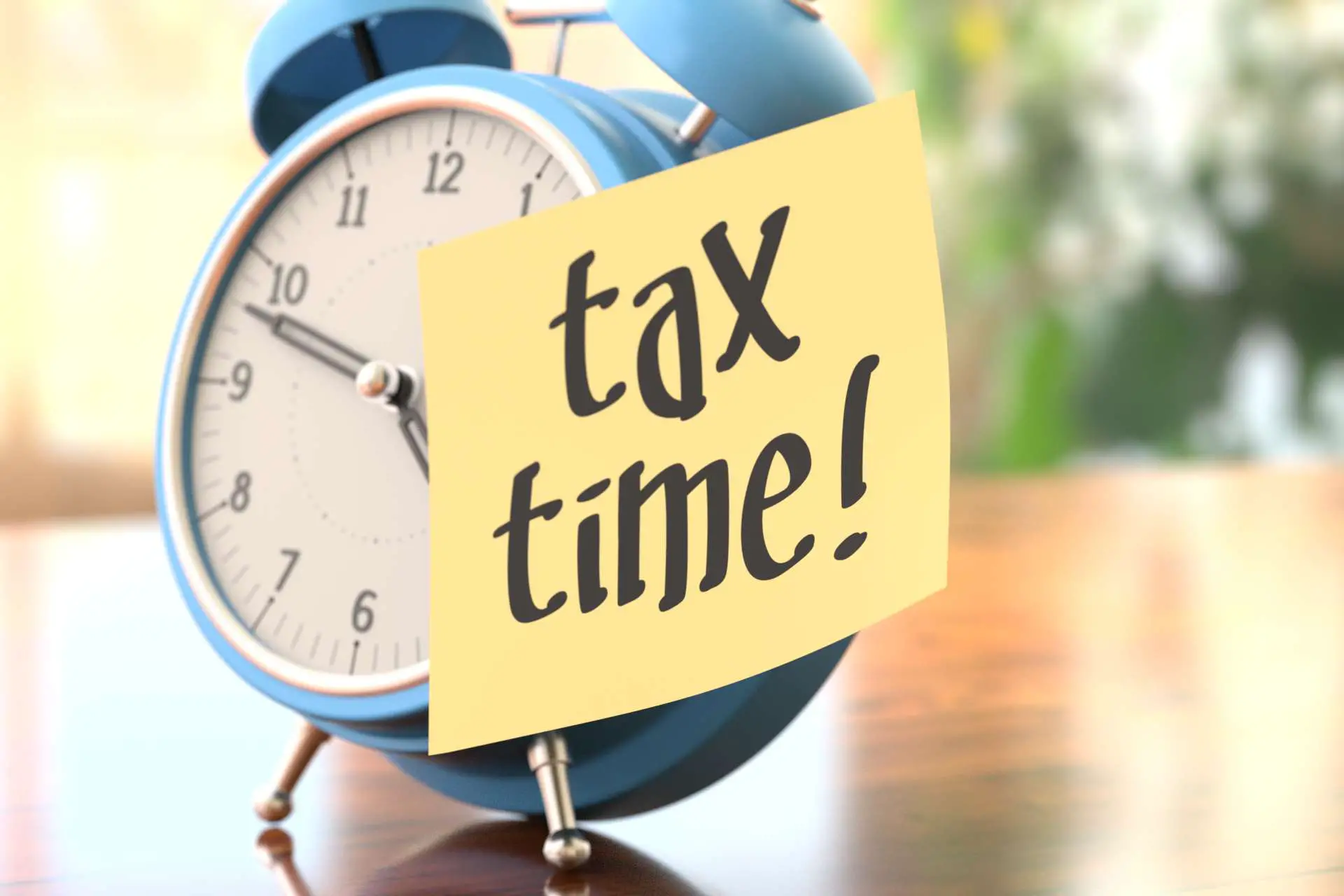 Alarm clock with tax time sticky note free image download