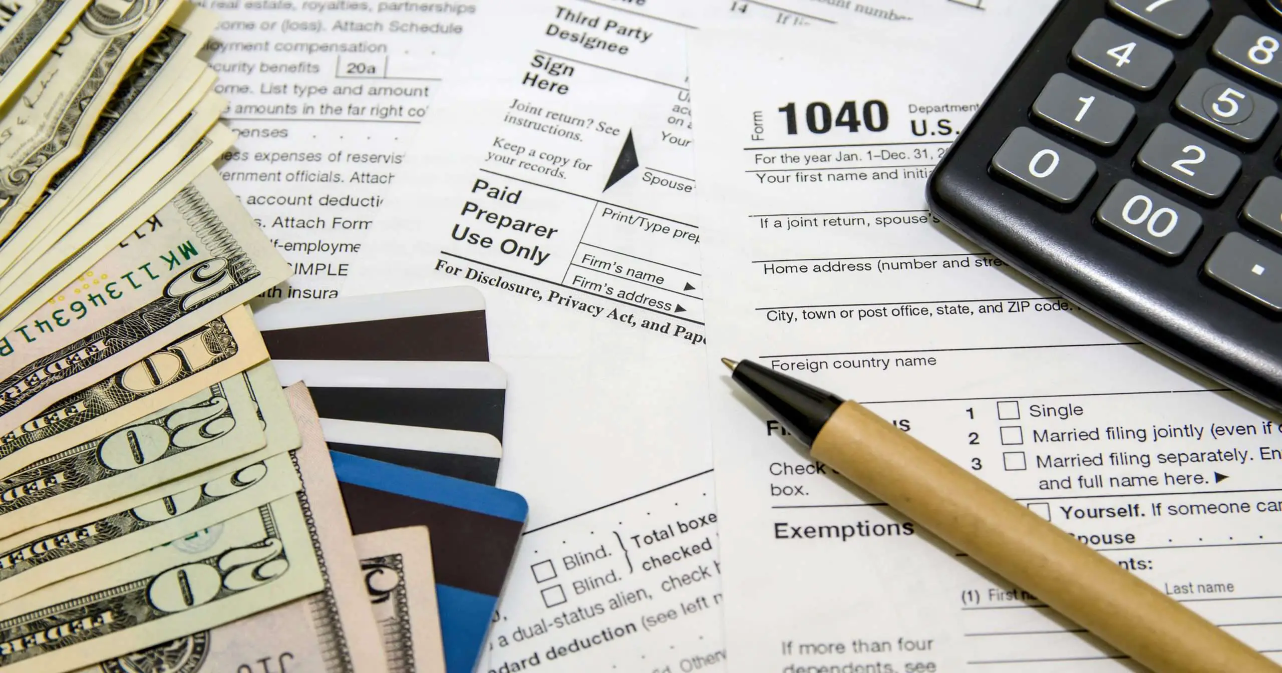 Paying taxes: The pros and cons of doing it with a credit card