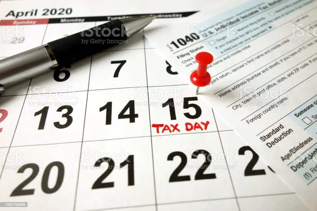 Usa Tax Due Date Marked On Calendar 15 April 2020 Blank 1040 Form And ...